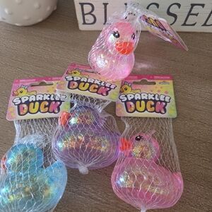 orb Curiosities Glitter Duck Squishy Pink  11$EACH